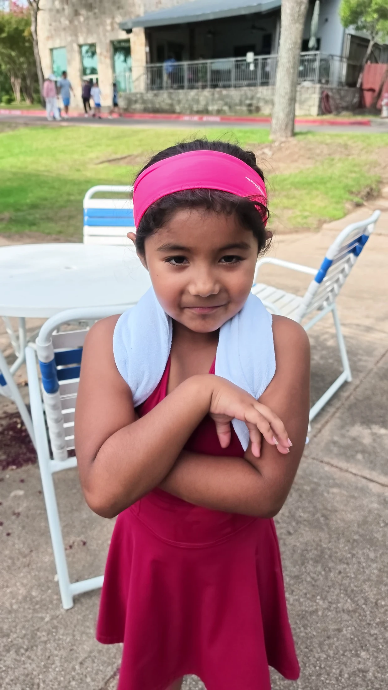 Penny smiling after practice with a towel around her neck